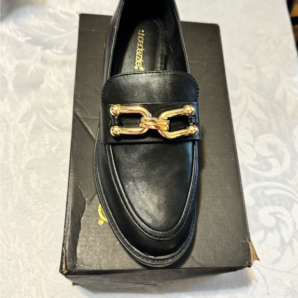 Black Leather Slip-On Loafer with Gold Chain Accent nib